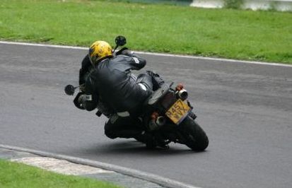 mike of lightning solihull midlands rock covers band riding triumph tiger round cadwell park
